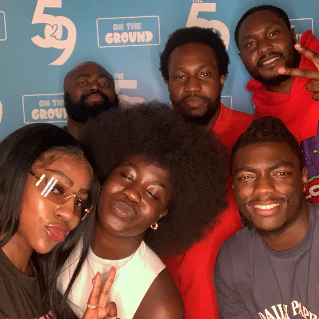 Guests posing in the selfie pod at The529